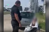 Fiica întinde mâna la cerșit, mama o păzește din BMW X5, în București