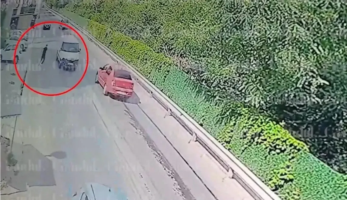 Un barbat a sărit pe fereastra casei și a scapat de ofițerii DIICOT. Foto/Gandul